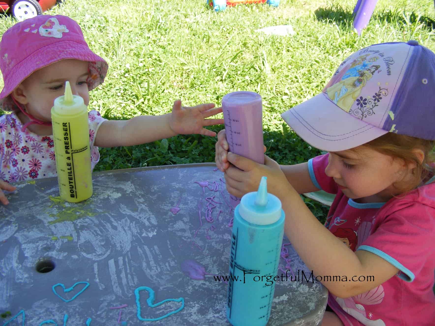 Puffy paint in squeeze bottles adds a different level to the painting artistically. Use it on a wipeable surface for lasting fun.