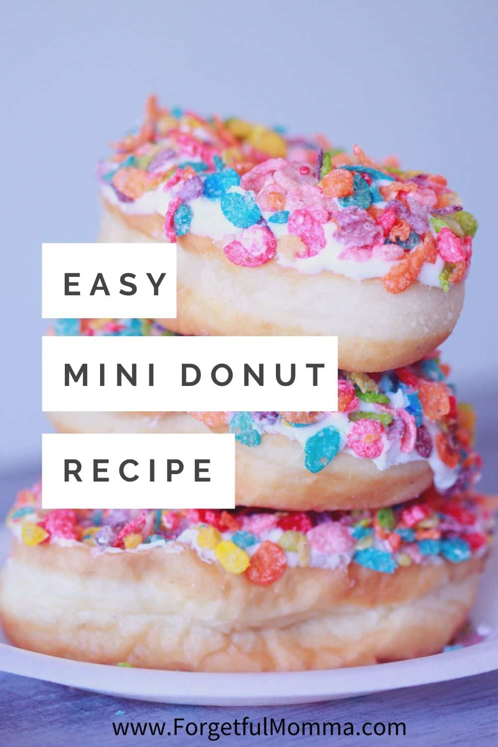 Simple Mini Donut Recipe - 3 donuts stacked on top of the other.