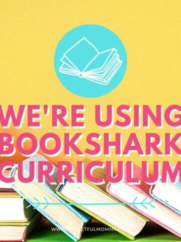 books laying on table with We're Using BookShark Curriculum text overlay