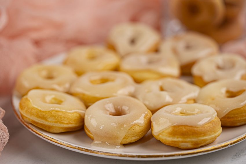 The glaze really pops with flavor for these mini donuts