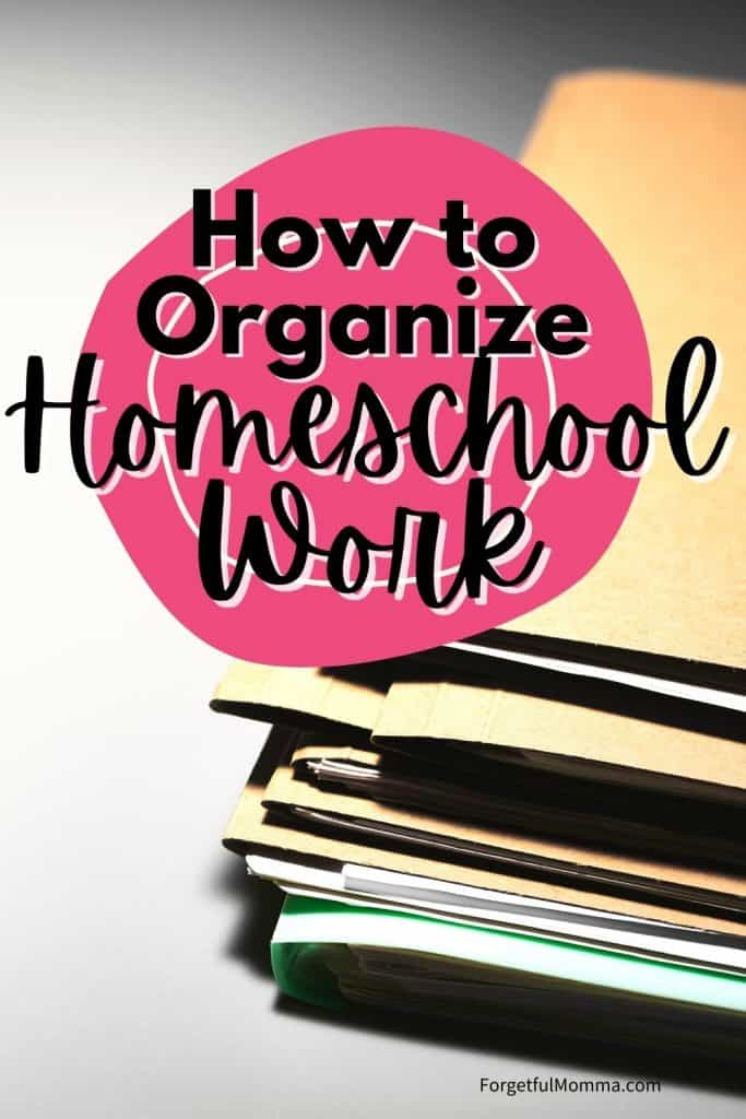 How to Organize Homeschool Work - files laying on desk with text overlay
