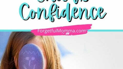How to Boost Your Child's Confidence pinterest image of girl holding a painted rock in front of her face with text overlay