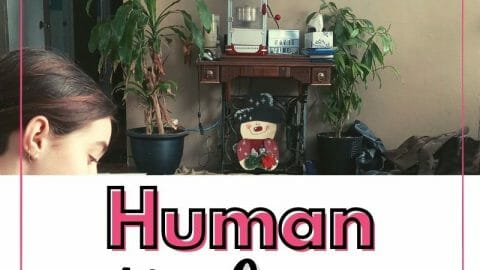 Human Biology Curriculum child sitting in front of a tv with text overlay