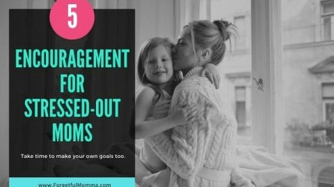 mom hugging girl child