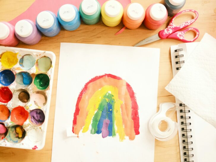 pink yellow and green abstract painting