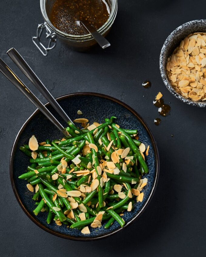 Green beans tossed with sliced almonds