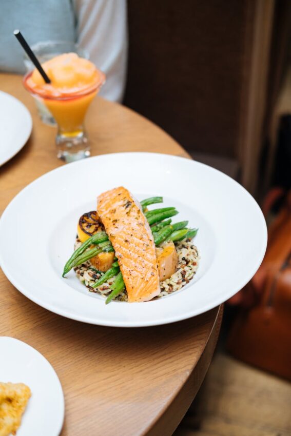 Grilled salmon served with quinoa and asparagus