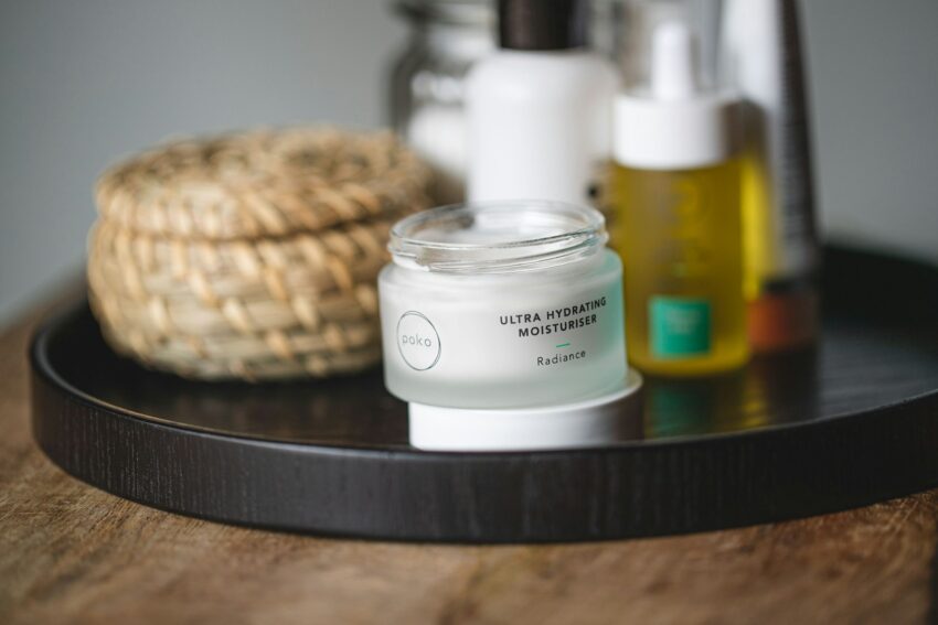 white and brown plastic bottle on black table