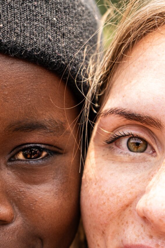 Close-up of two people's faces side-by-side